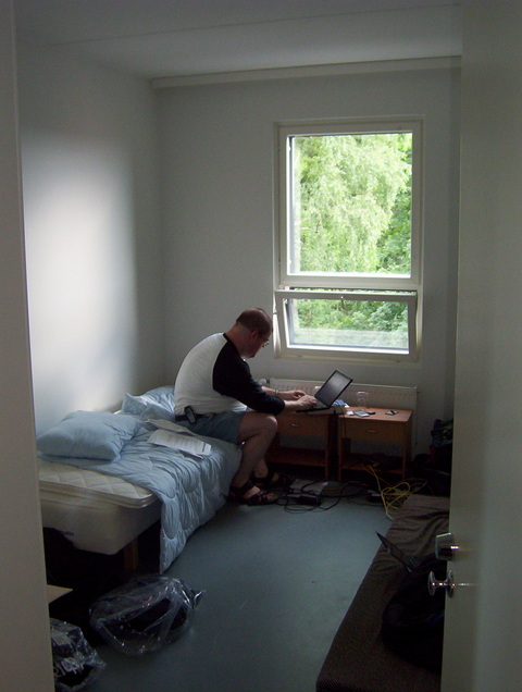 Uncle Steve checking his email in our room.