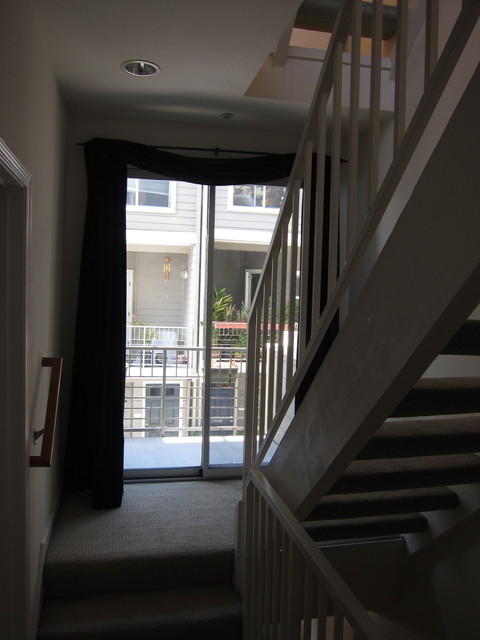 Second floor, looking out to front balcony area