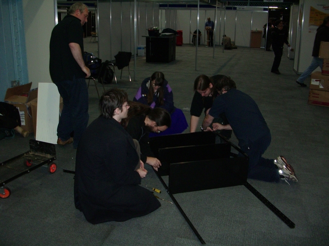How many geeks does it take to disassemble some shelves?